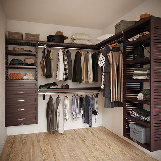 Espresso L Shaped walk in closet organizer with 5 drawers,  clothes and hanging in a room.