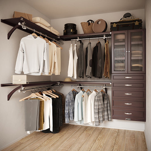 Espresso L Shaped walk in closet organizer with 5 drawers and doors,  clothes and hanging in a primary bedroom closet.