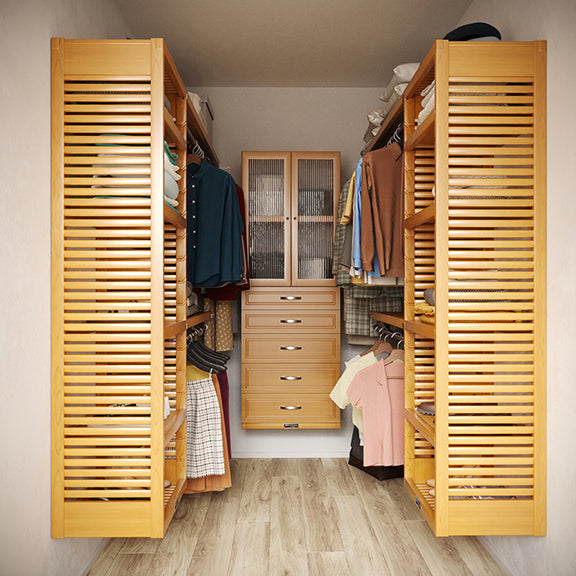 Honey maple U shaped walk-in closet with shelves, drawers ,doors and clothes on hangers