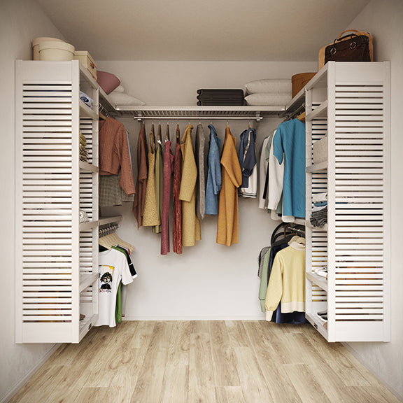 White U shaped walk-in closet organizer with shelves and hanging clothes
