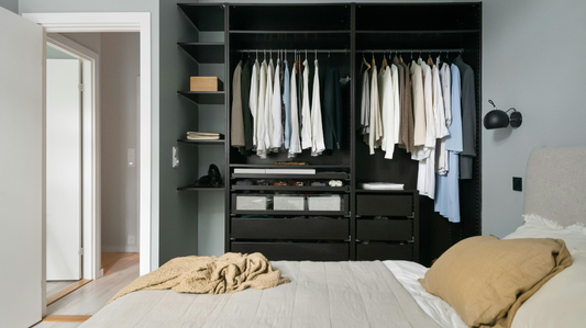 Closet organizer installation in bedroom storage space