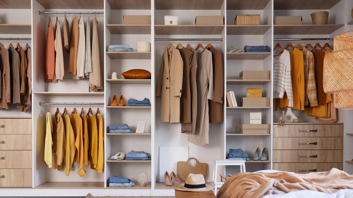 Closet organizer with towers, drawers, shelves, and hanging space