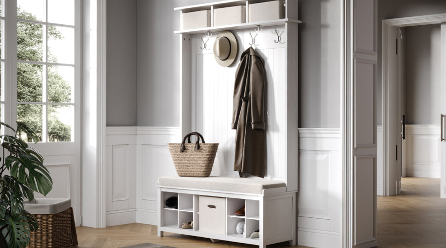 White coat rack with hooks and storage shelves in a home entryway.