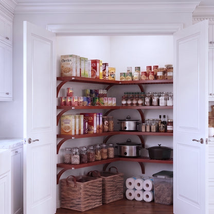 A fully stocked L shaped walk-in pantry with 4 tiers of red mahogany solid wood shelves filled with kitchen appliances and  grocery foods.