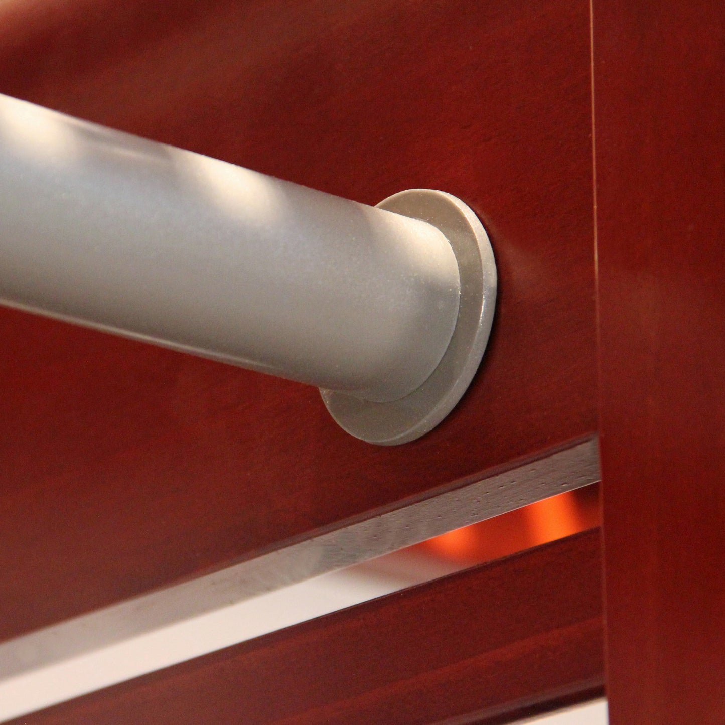 closeup of garment bar on closet organizer