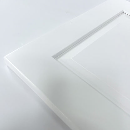 close up detail of white raised panel in tower doors