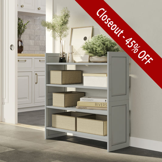grey 2 tiered shelving rack holding books in hallway
