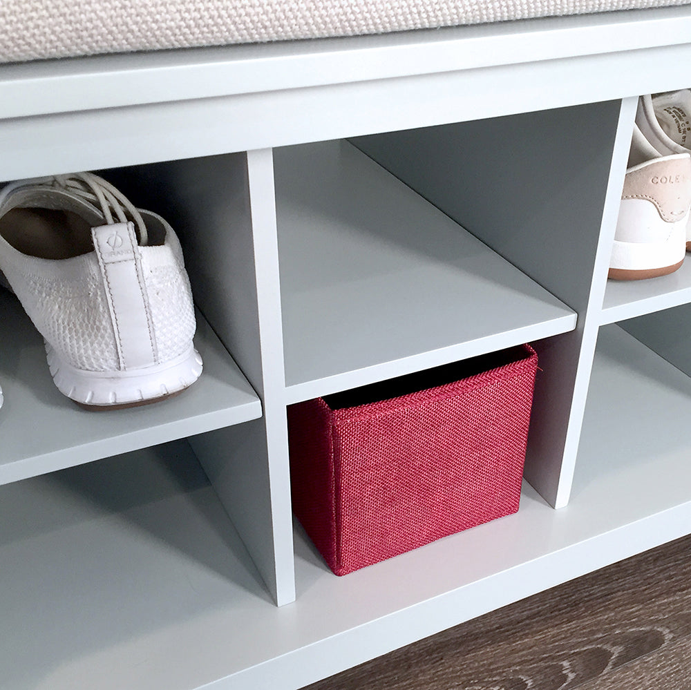 closeup of modular shoe cubbies in grey shoe bench