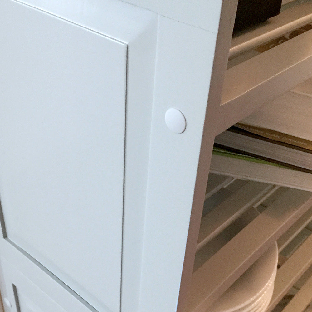 closeup detail of the raised panel side of the grey shelving rack