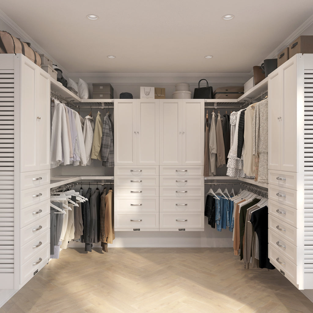 After image of a walk-in closet with white wardrobes, clothes racks, and various garments.