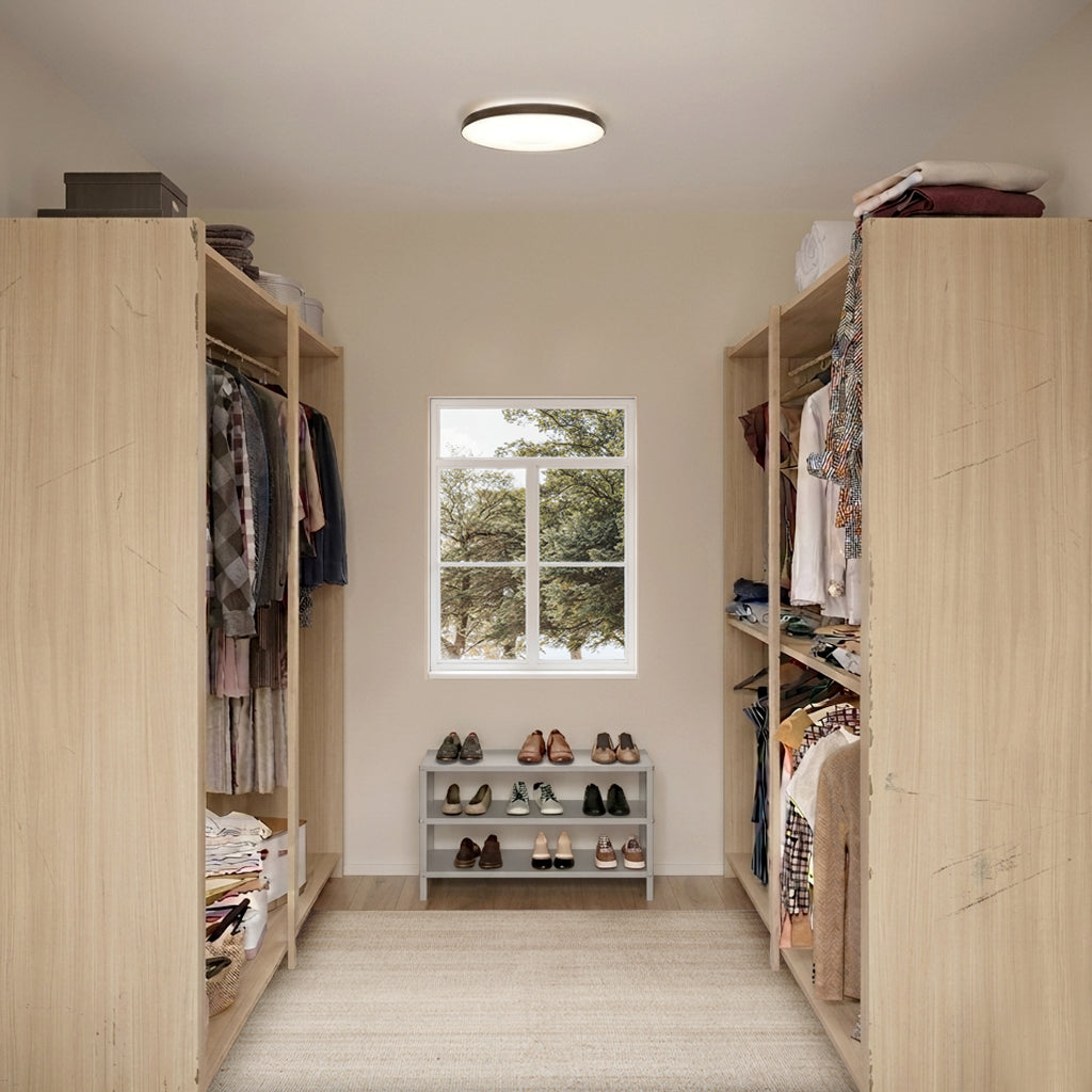 Before Closet with wooden shelves, clothes, and a small table with shoes in a room with a window.